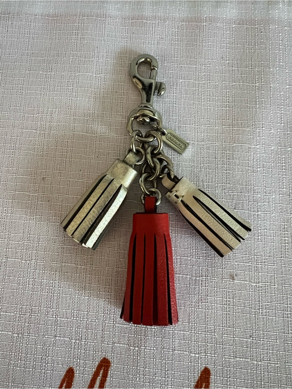 Coach Silver & Red Leather Tassel Keychain Charm